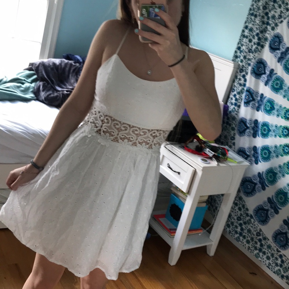 White dress with lace cutouts